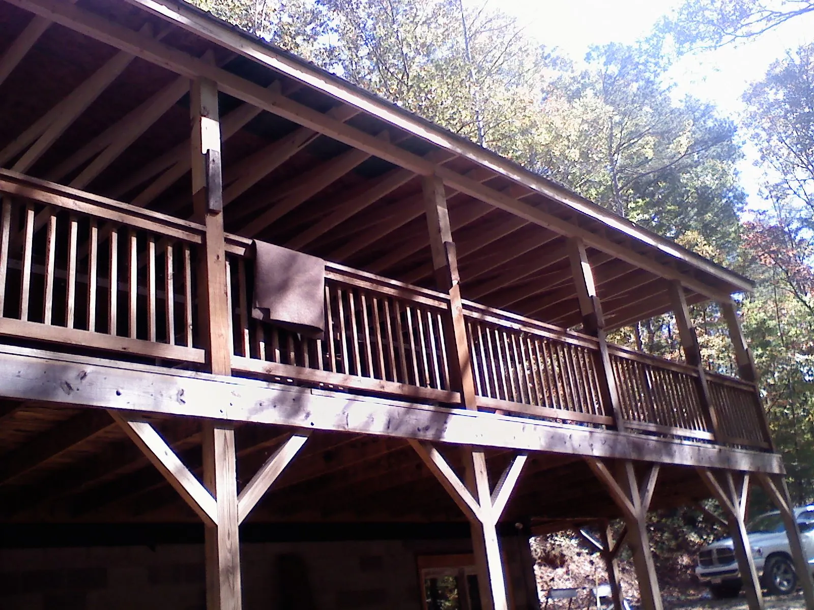 Timber framing under a new elevated porch and deck — Roof Leak Repair in Bunch by Roofing Brothers